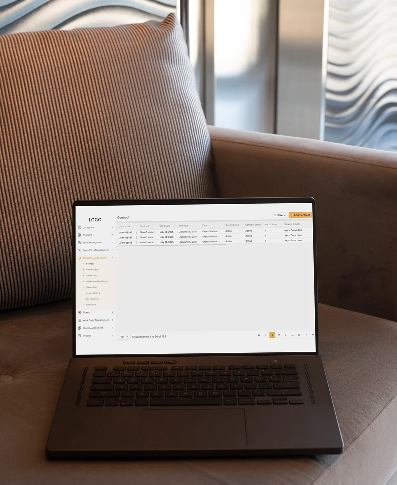 Laptop screen displaying a business software interface with a list of contracts and management options, resting on a couch