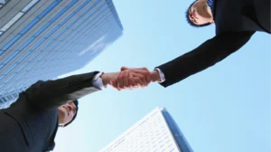 Doing business with DzAani - Business partners shaking hands